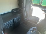 a picture of the inside of a vehicle with the seats down