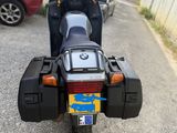 a motorcycle that is parked on the side of the road