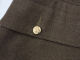 a close up of a jacket with a button on it