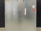 an image of a stainless steel freezer in a warehouse