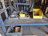 a workbench with a lot of tools on top of it