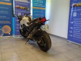a motorcycle that is parked in a showroom