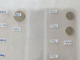 a lot of coins that are on the table