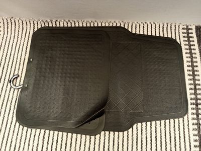 a close up of a pair of oven mitts on a towel