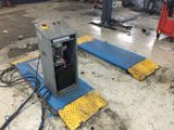 une machine posée sur le sol dans le garage