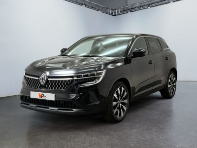 a black suv parked in a garage with a white wall