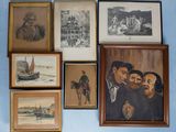 many framed pictures on the wall of this room