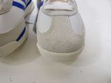a close up of a pair of shoes on a table