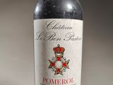a bottle of wine that is sitting on a table