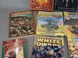 a lot of books that are on the table