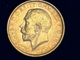a close up of a coin on a black surface