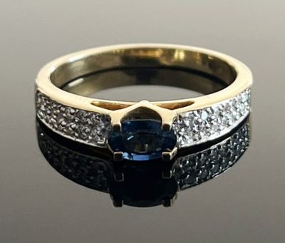 an image of a blue sapphire and diamond ring