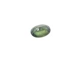 a close up of a green gemstone on a white background