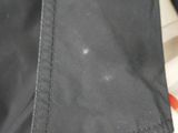 a close up of a pair of black pants on a table