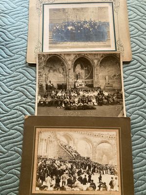 two old photos of people sitting in front of a building on a bed