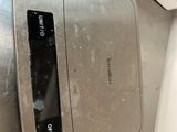 a toaster that is on the counter in the kitchen