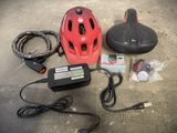 an image of a bicycle helmet, helmet, charger, and other items