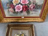 a picture of a painting and a picture of flowers on the floor