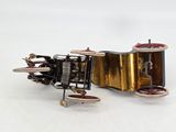 a small model of a motor bike on a white surface