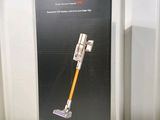 the box for the dysonclem vacuum is open on the table