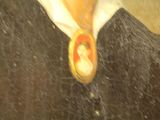 a painting of a man wearing a tie with a picture of a woman on it
