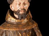 a statue of a man with a beard and a hat