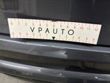 a sticker that says vauto on the back of a car