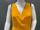 an image of a mannequin mannequin wearing a yellow dress
