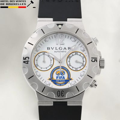 an image of a close up of a watch on a white surface
