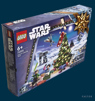 une boîte de Lego Star Wars posée près d'un sapin de Noël