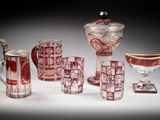 a lot of glass items that are sitting on a table