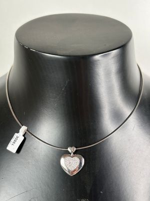a close up of a necklace on a mannequin mannequin