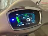 a close up of a car dashboard with a clock on it