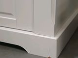 an image of a kitchen with a white cabinet and a sink