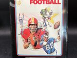 a close up of a box with a football game on it