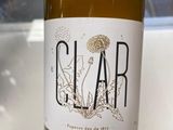 a bottle of wine that is sitting on a table
