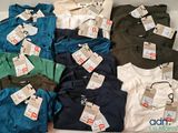 a box full of men ' s clothing with price tags on them