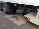 a truck that has a flat bed on the back of it
