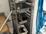 an image of a commercial kitchen with a rack of food