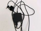 a black charger plugged into a black charger