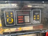 a close up of a machine with buttons on it