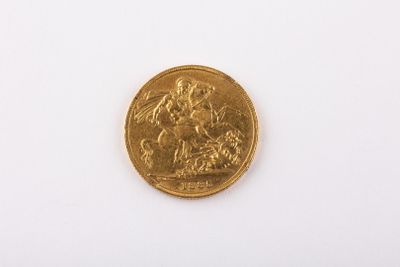 an image of a gold coin sitting on top of a white surface
