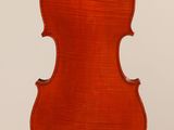 an old violin with a wooden back and a long neck