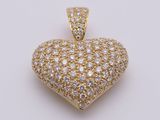 a diamond heart pendant on a white background