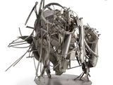 a metal sculpture of a horse made out of scrap