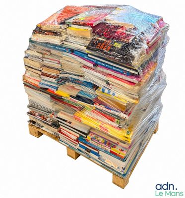 a stack of magazines on a pallet on a white background