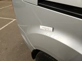 a close up of a car ' s bumper with a sticker on it
