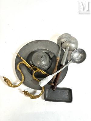 a plate with spoons, spoons, and other items on it