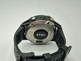 the watch is black and has a silver face and a black band