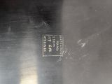 an image of a close up of a metal object on a table